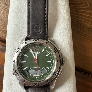 Timex Green Dial Watch with Silver Case and Black Strap